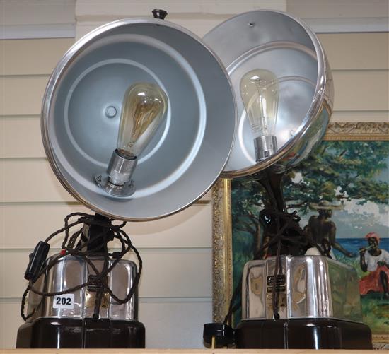 A pair of converted heater lamps